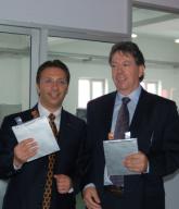 Steve Schneider (left) CEO of electric car maker ZAP and John Honey of CCT Power Head hold production cells of a new battery that achieves up to five times the power of today's lead-acid batteries using advanced nanotechnology from Harbin, China manufacturer Advanced Battery Technologies, Inc. (PRNewsFoto/ZAP) 