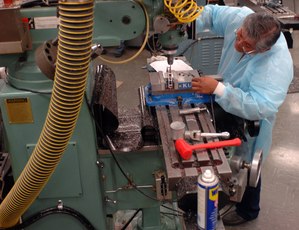 Photo by Dan Dry.

Ernie Mendoza at work in the University of Chicago machine shop.