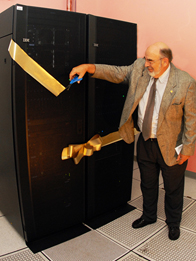 Photo: Jacque Brund.

MJ Soileau, vice president for Research and Commercialization, cuts the ribbon for the new high-performance computer funded by Army grants.