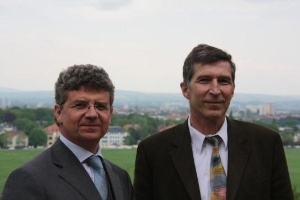 Prof. Stamm from the Leibniz Institute of Polymer Research (right) and Bruno Linn, Director Sales Europe from Carl Zeiss Nano Technology Systems division welcomed the guests. (Photo: Business Wire)