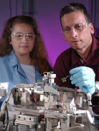 Argonne scientist Jorg Maser loads a sample into the hard X-ray nanoprobe. The nanoprobe uses brilliant X-rays with photon energies from 3 to 30 keV to probe the properties of nanoscale materials with a spatial resolution of 30 nm. The system provides a combination of scanning-probe and full-field transmission imaging. Argonne won a R&D 100 award for the hard X-ray nanoprobe.