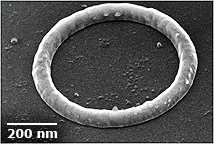 Harris made the first definitive measurement of an electric current that flows continuously in tiny, but ordinary, metal rings. (Photo: Jack Harris/Yale University)