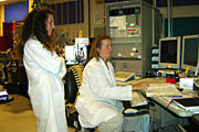 LLNL's Jennifer Pett-Ridge, right, runs the NanoSIMS and analyzes some arsenic-grown cells from Mono Lake as NASA/USGS's Felisa Wolfe-Simon observes.