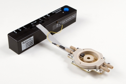 The EC Cell, shown with heater, provides heating from ambient to 60C.  The heater allows, for example, studies of electrolytes which are not liquids at room temperature.