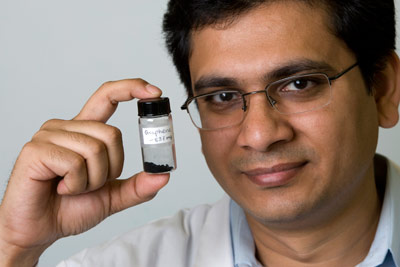 Amartya Chakrabarti holds up a sample of graphene produced via the dry-ice method.