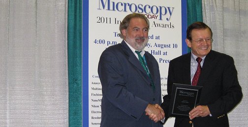 WITec US Managing Director Bob Hirche receives the Microscopy Today Innovation Award 2011 from Microscopy Today Editor in Chief Charles Lyman.