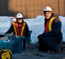 Dr Denis O'Carroll and colleagues at groundwater test site in Ontario, Canada