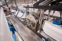 To create a precise X-ray band and make the Linac Coherent Light Source even more laser-like, researchers installed this chamber with a slice of diamond crystal. The new hardware sits halfway down the 130-meter bank of magnets where the X-rays are generated.

Credit: Photo by Matt Beardsley, SLAC National Accelerator Laboratory