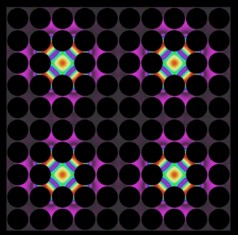 Thermal lattices, shown here, are one possible application of the newly developed thermocrystals. In these structures, where precisely spaced air gaps (dark circles) control the flow of heat, thermal energy can be "pinned" in place by defects introduced into the structure (colored areas).
Illustration courtesy of Martin Maldovan