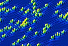 Scientists have found that the substitution of cobalt atoms into the crystal framework of an iron-based materialwhich is required to convert the material from a magnet into a superconductoralso introduces elongated impurity states at each cobalt atom (note the directional alignment of "twin" peaks around each cobalt atom in the electronic structure map). These elongated impurities then scatter electrons in an asymmetric way that explains many of the material's unusual properties, and could eventually lead to the design of new types of superconductors for practical applications in energy transmission and storage.