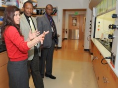 Robin DiFrancesco with the Zimbabwe minister, Dr. Dzinotyiweyi (center), and co-director of UB-AZ AITRP, Charles Chiedza Maponga 