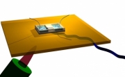 A diagram of one of the group's experimental setups shows a copper plate that can be heated using a torch underneath it, to study the effect of temperature on the process. On top of the plate, an apparatus consisting of two reservoirs separated by a silicon structure that has a single carbon nanotube on top of it. When a power source is connected to the electrodes (the wires extending up from the device), charged molecules (ions) from one of the reservoirs can pass through the tube, and its progress can be monitored using a scanning electron microscope.
Illustration courtesy of Choi et al.