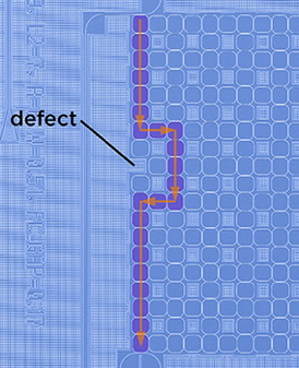 In this false-color scanning electron microscope image, the arrow shows the path light takes as it hops between silicon rings along the edge of the chip, successfully avoiding defects  in this case a missing ring.
Credit: NIST