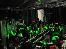 Part of the optical system used to trap and manipulate atoms. The arrangement of mirrors and lenses brings the a large number of laser beams onto the atoms. Photo : Jean-Philippe Brantut / ETH Zurich