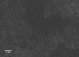 This image from a scanning transmission electron microscope shows the individual atoms in a two-dimensional sheet of molybdenum diselenide.
CREDIT: E. Ringe/Rice University