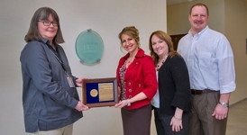 Interdisciplinary Science Building (ISB) project team members who received the U.S. Department of Energy (DOE) Secretary's Achievement Award include (from left) Federal Project Director Gail Penny of the DOE Brookhaven Site Office, Brookhaven Lab's ISB Project Manager Peggy Caradonna, Project Controller Laurie Casarole, and Deputy Project Manager Chris Ogeka.