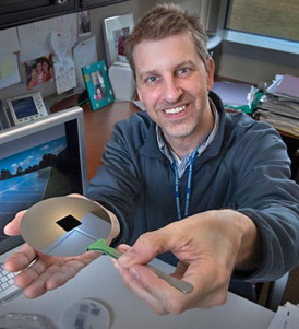 Brookhaven physicist Charles T. Black with one of his nanostructured surfaces