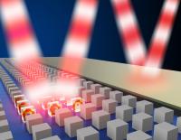 This is an artist's impression of a comparison between a magnetic mirror with cube-shaped resonators (left) and a standard metallic mirror (right). The incoming and outgoing electric field of light (shown as alternating red and white bands) illustrates that the magnetic mirror retains light's original electrical signature while a standard metallic mirror reverses it upon reflection.

Credit: S. Liu et al.