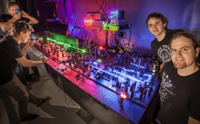 Under certain conditions, two individual, indistinguishable photons will form a pair as a result of interference. This subtle quantum effect has been successfully imaged for the first time by Micha? Jachura and Rados?aw Chrapkiewicz, doctoral students at the UW Faculty of Physics (both shown here, in multiple copies and grouped into pairs on both sides of the measuring apparatus).
CREDIT: Source: UW Physics, R. Chrapkiewicz