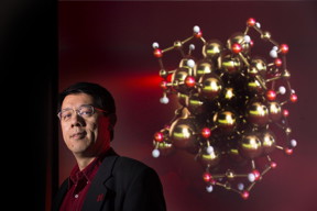 Xiao Cheng Zeng, chemistry professor at the University of Nebraska-Lincoln, is shown with a model of a gold nano-cluster.
CREDIT: Craig Chandler/University Communications/University of Nebraska-Lincoln