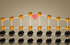 Inserting helium atoms (visualized as a red balloon) into a crystalline film (gold) allowed Oak Ridge National Laboratory researchers to control the material's elongation in a single direction.
CREDIT: ORNL