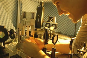 Dr Peter Schemmel loads a sample into the Deben tensile stage for testing at Heriot-Watt University.