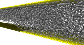 A cavitation bubble is formed in the lubricant between the oil-attracting (yellow) and the oil-repellent surface (black). When used as a buffer, it might reduce wear.

Photo: KIT