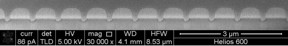 This is a cross-sectional scanning electron microscopy images of a 750 nm period grating fabricated by focused ion beam milling in a 300 nm thick amorphous germanium antimony telluride film on silica.
CREDIT: Karvounis/Gholipour/MacDonald/Zheludev, Optoelectronics Research Centre, University of Southampton