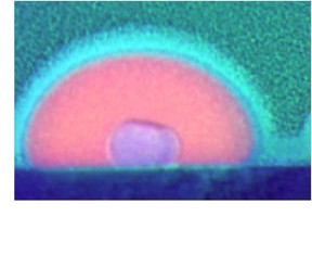 A side, false-color view of a solid gallium core coexisting within a liquid gallium nanoparticle. These novel nanoparticles show unique interactions with light and electrons at the atomic scale, which could be exploited by a field called plasmonics for new light-based technologies.
CREDIT: April Brown, Duke University