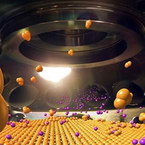 This composite image offers a glimpse inside the custom-designed molecular beam epitaxy system that the Brookhaven physicists use to create single-crystal thin films for studying the properties of superconducting cuprates.