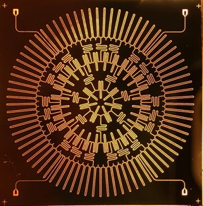 A US Army project at Princeton University results in an electronic array on a microchip that simulates particle interactions in a hyperbolic place, a geometric surface in which space curves away from itself at every point.

CREDIT
Princeton University