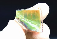 Inspired by chameleon skin, this flexible material changes color in response to heat and light.
Credit: Adapted from ACS Nano 2019, DOI: 10.1021/acsnano.9b04231