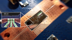 Researchers at Princeton University have made an important step forward in the quest to build a quantum computer using silicon components, which are prized for their low cost and versatility compared to the hardware in today's quantum computers. The team showed that a silicon-spin quantum bit (shown in the box) can communicate with another quantum bit located a significant distance away on a computer chip. The feat could enable connections between multiple quantum bits to perform complex calculations.

CREDIT
Image by Felix Borjans, Princeton University