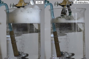 In a beaker with a constant stream of bubbles, inserting a piece of the new textured material developed by the MIT team (gray object extending into the surface at top) causes the foam buildup at the top of the beaker to dissipate almost completely within ten minutes.

Courtesy of the Varanasi Lab