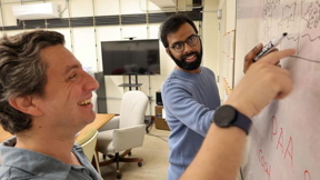 Virginia Tech physicist C. Nadir Kaplan (at left) and doctoral candidate Chinmay Katke (right) discovered a microscopic phenomenon that could greatly improve the performance of soft devices, such as agile flexible robots or microscopic capsules for drug delivery. Photo by Spencer Coppage for Virginia Tech.

CREDIT
Photo by Spencer Coppage for Virginia Tech.